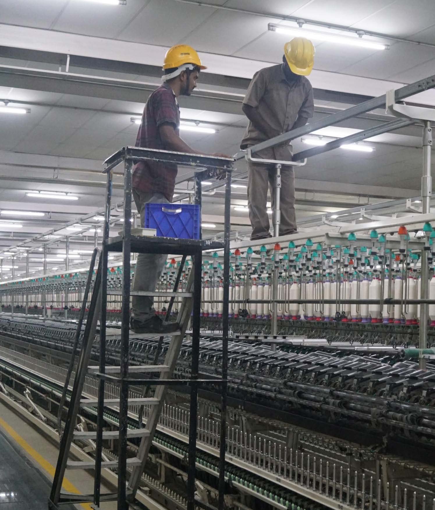 Technicians fixing the ring frame